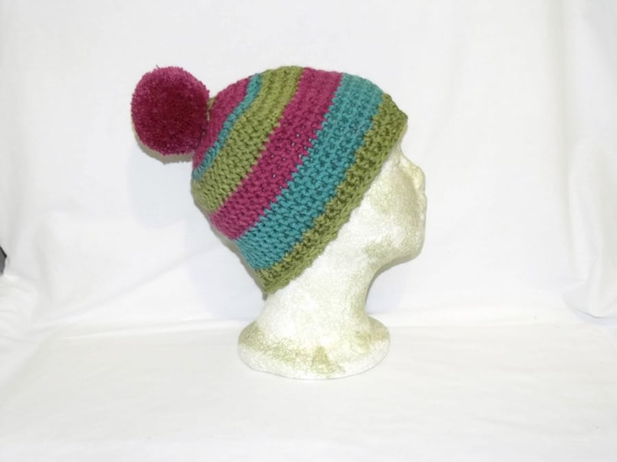 multi coloured ladies winter hat, crocheted woolly pom pom beanie