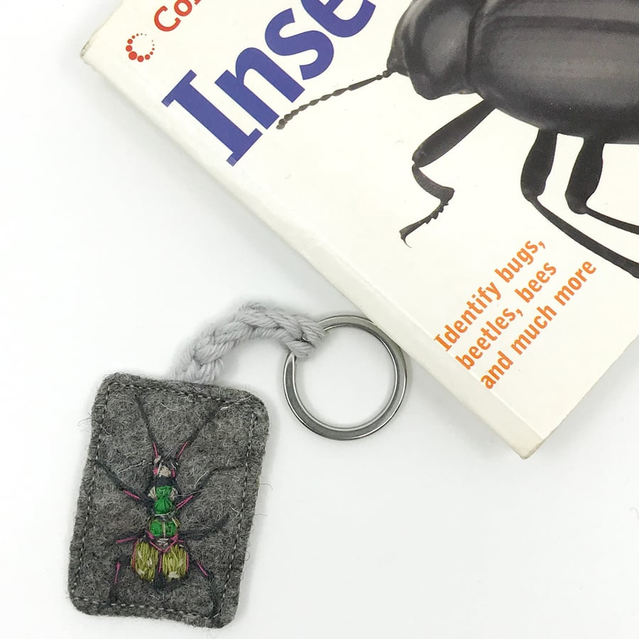 Hand embroidered beetle on a keyring