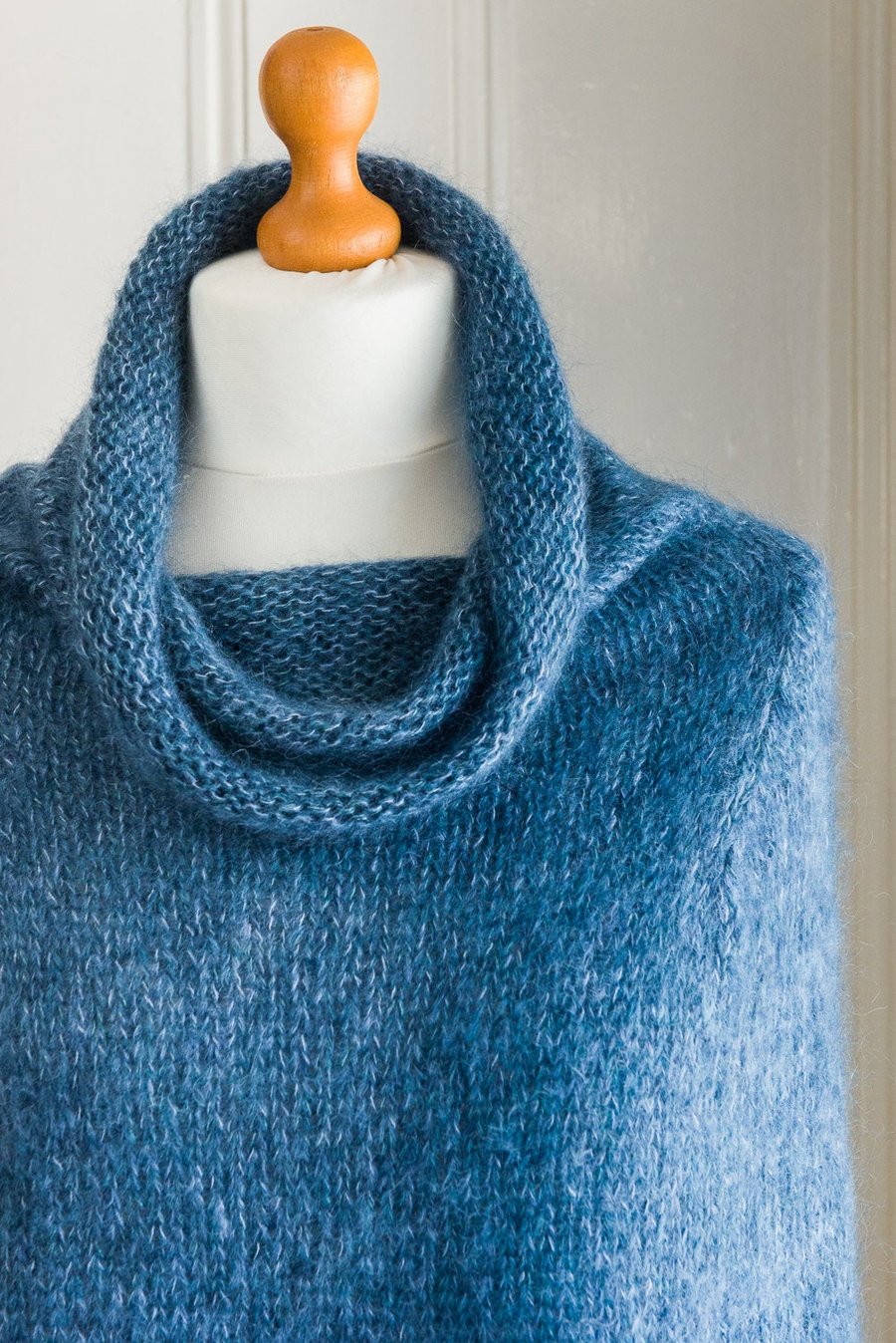 This cape is 'The Supersized Hug' - hand knit, isoft and warm capelet or poncho