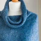 This cape is 'The Supersized Hug' - hand knit, isoft and warm capelet or poncho