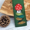 Embroidered mushroom bookmark. 