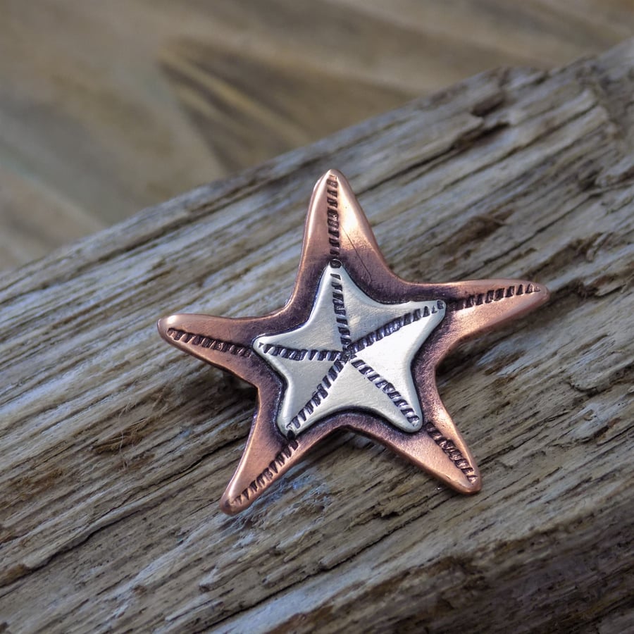 Silver and copper starfish mixed metal brooch 