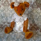 Collector's teddy bear 'born again' from antique and vintage materials. Matilda