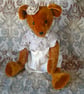 Collector's teddy bear 'born again' from antique and vintage materials. Matilda
