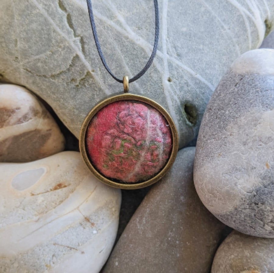Felted pendant - deep pink coral, hint of green in bronze bezel