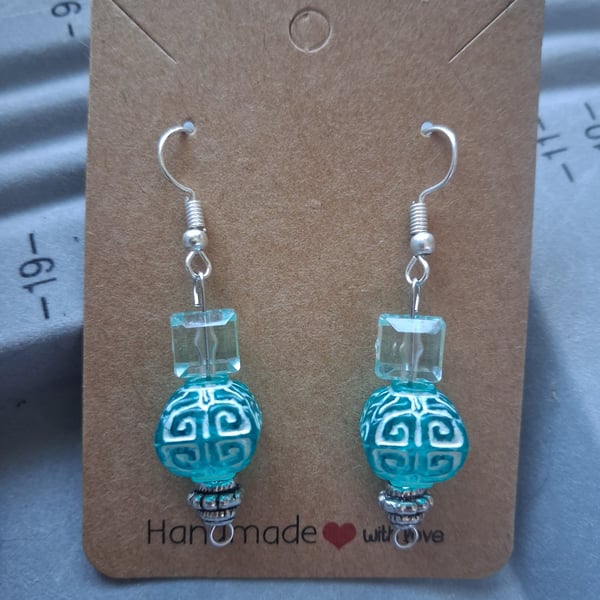 turquoise blue glass and patterned dangle earring