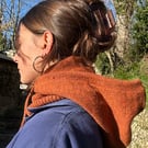 Burnt orange knitted hood, made with 100% Shetland wool