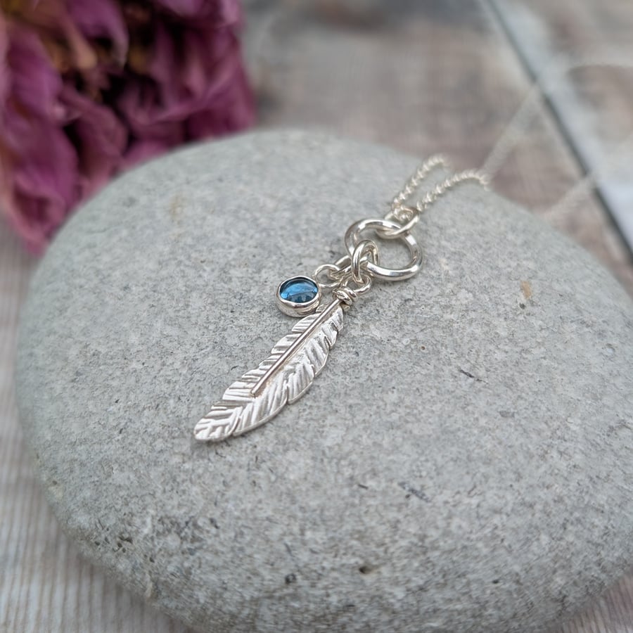 Sterling Silver Feather Charm Necklace with Topaz