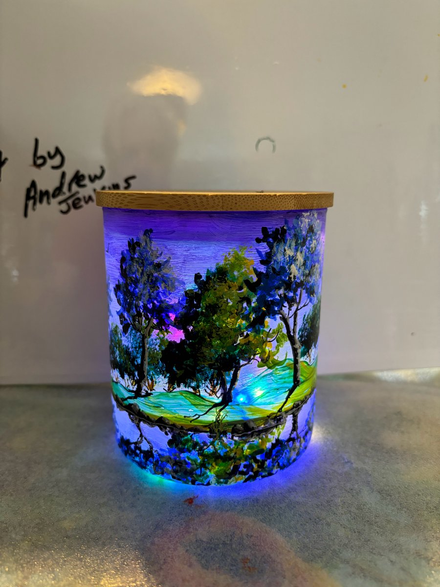 A hand painted and fired glass vase with wooden lid by Andrew Jenkins 