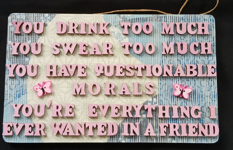 Hand decorated hanging wooden sign 