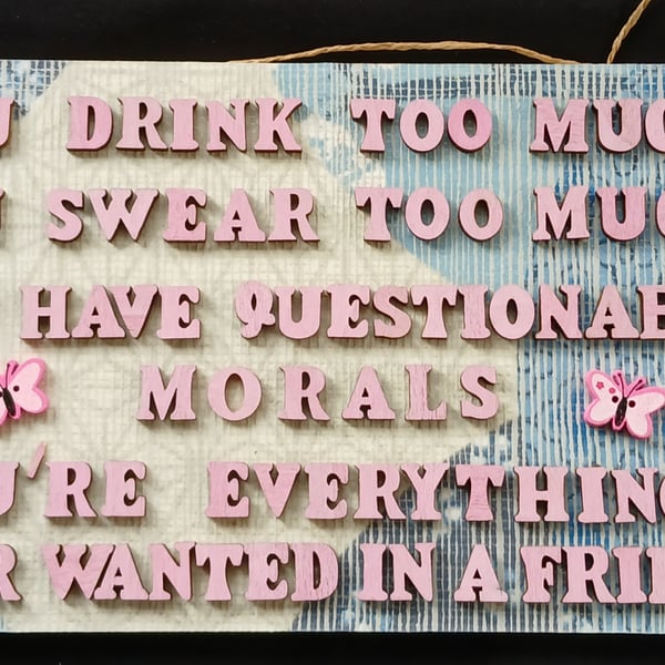 Hand decorated hanging wooden sign 