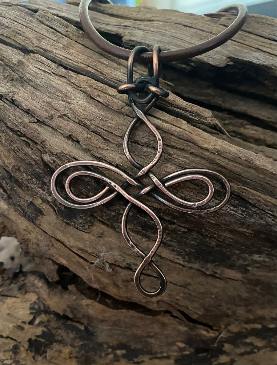 Copper wire celtic knot cross pendant. 