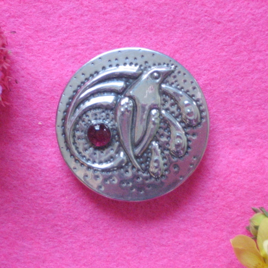 Bird of paradise garnet brooch