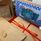 Wooden brooch with wavy flowers