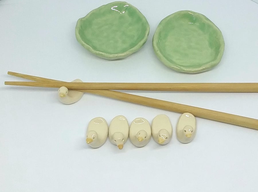 Ceramic hand made chopsticks rest ducks and pottery ponds or soy sauce dip bowls