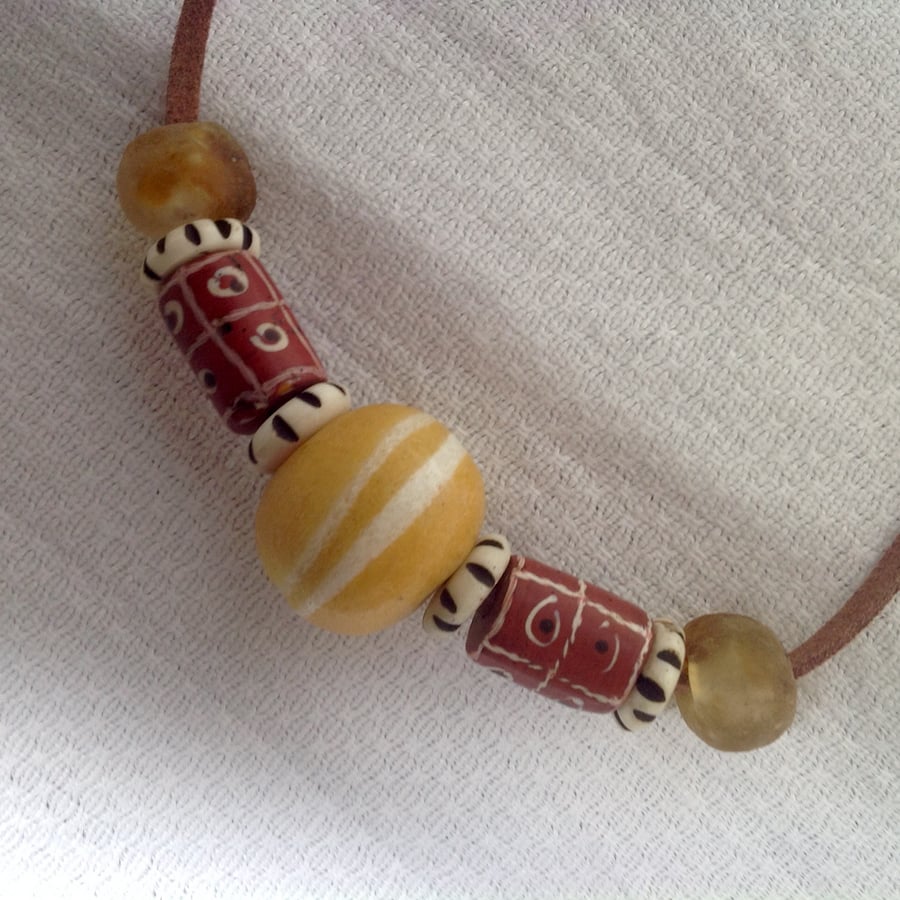 Cord necklace with rare old African trade beads and prayer beads