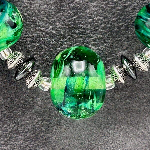 green swirly and sparkly handmade lampwork glass necklace