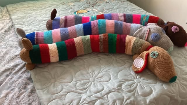 Draught Excluder -  Colourful Hand Knitted Sausage Dogs