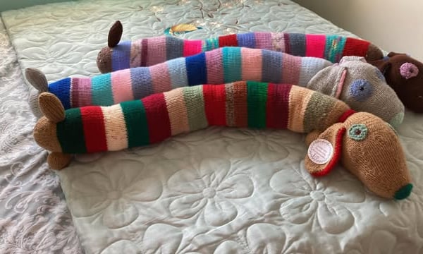 Draught Excluder -  Colourful Hand Knitted Sausage Dogs
