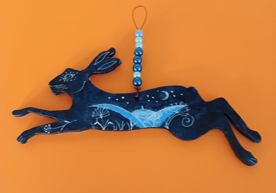 Dark blue hare shape hand painted  with  moonlit landscape