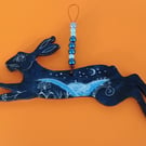 Dark blue hare shape hand painted  with  moonlit landscape