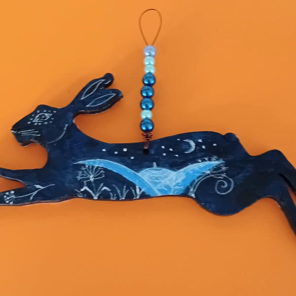 Dark blue hare shape hand painted  with  moonlit landscape