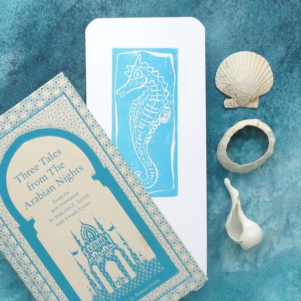 Hand printed seahorse bookmark in turquoise aqua blue on white
