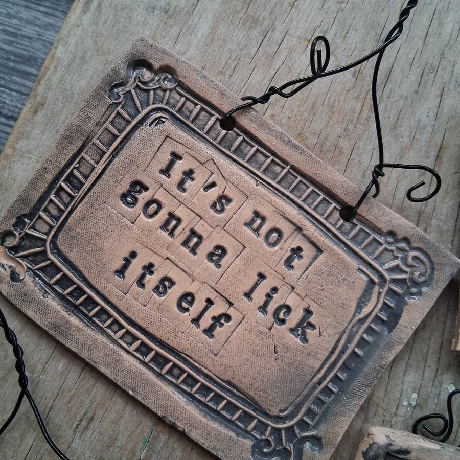 Image of LAST ONE! rustic ceramic pottery sign-its not going to lick itself