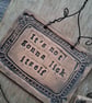 LAST ONE! rustic ceramic pottery sign-its not going to lick itself