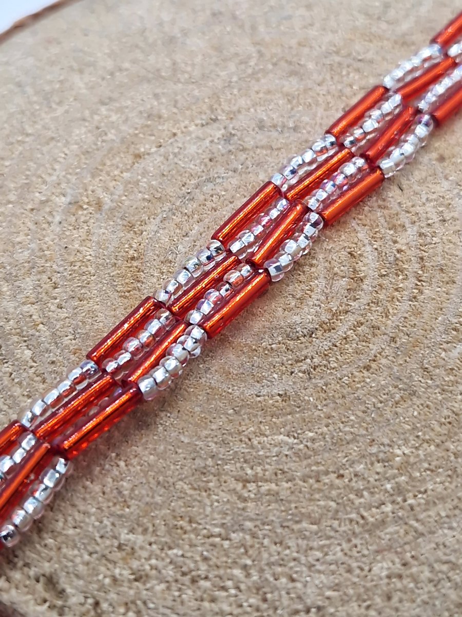 Orange and silver autumnal beaded bracelet