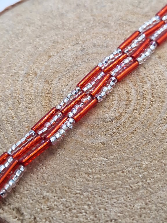 Orange and silver autumnal beaded bracelet