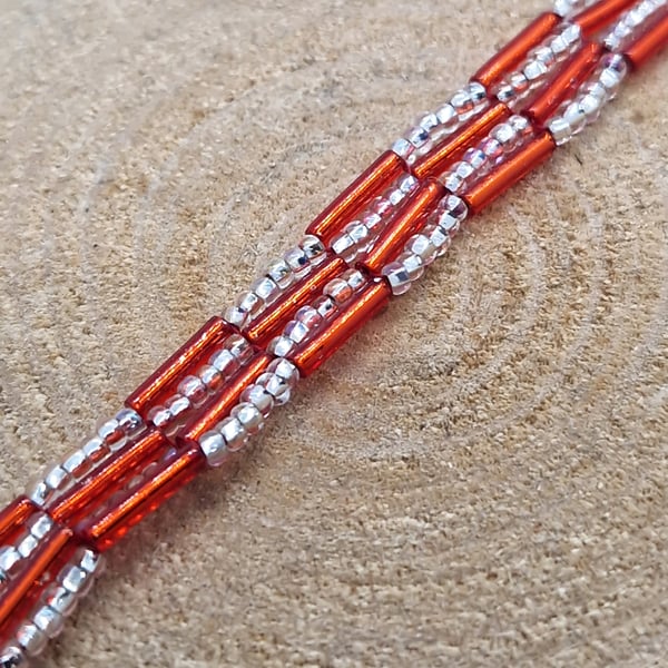 Orange and silver autumnal beaded bracelet
