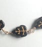 Gold filled chain necklace with black and gold Czech glass  leaf beads - Image 2