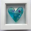 Cast glass heart in a box frame