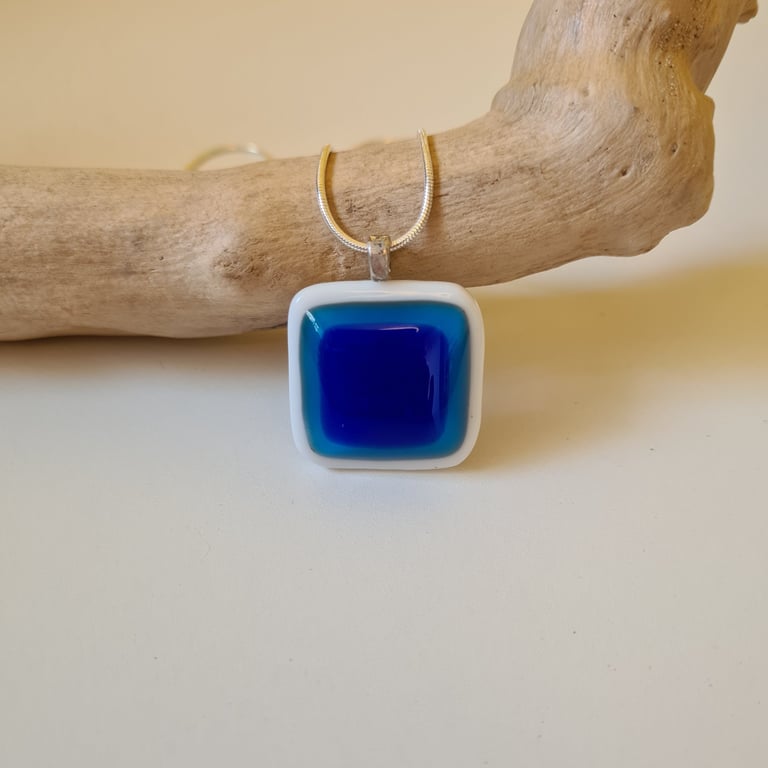 White, turquoise and blue fused glass pendant