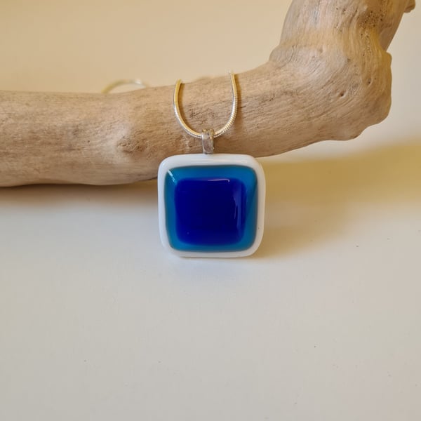 White, turquoise and blue fused glass pendant