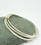 Clara by Fedha - stylish set of three silver bangles with solid gold link - Image 4