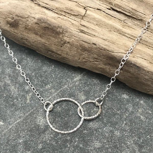 Minimalist style sterling  silver interlocking sea bubble circle necklace