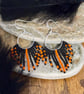 Halloween fringe hoop earrings in orange and black - Image 2