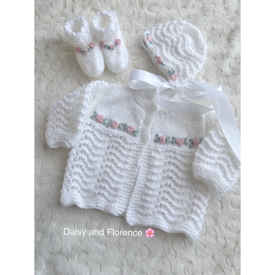 Hand knitted baby jacket, bootees and bonnet