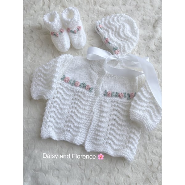 Hand knitted baby jacket, bootees and bonnet