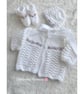 Hand knitted baby jacket, bootees and bonnet