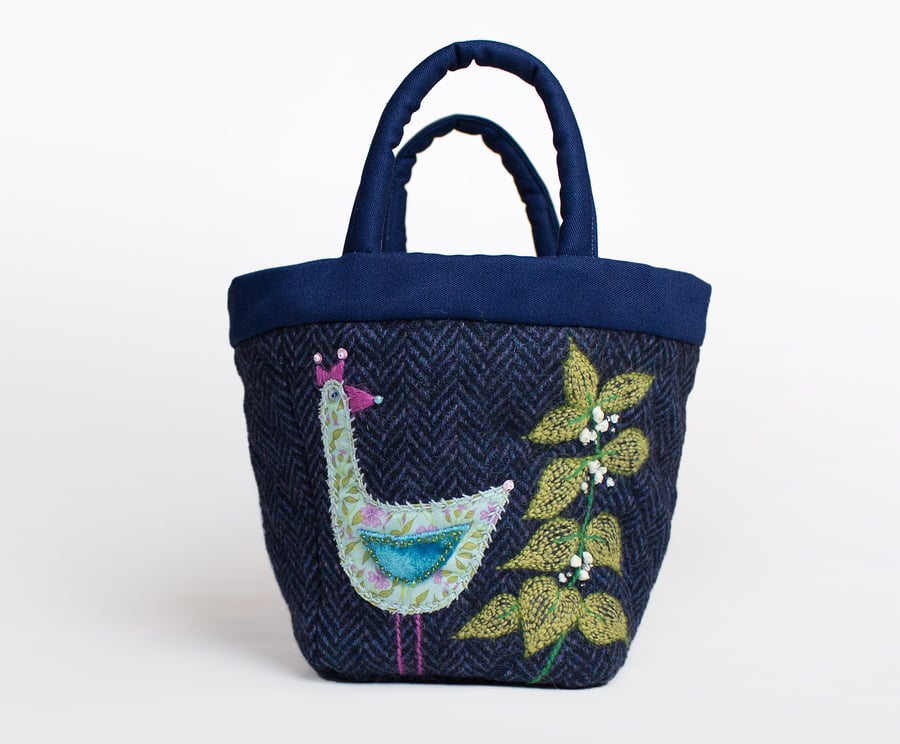Navy tweed project bag with hand embroidered bird and dead nettle