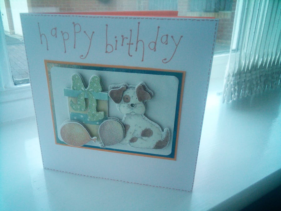 Cute dog with gift birthday card