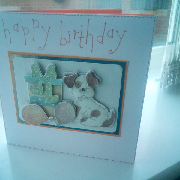 Cute dog with gift birthday card