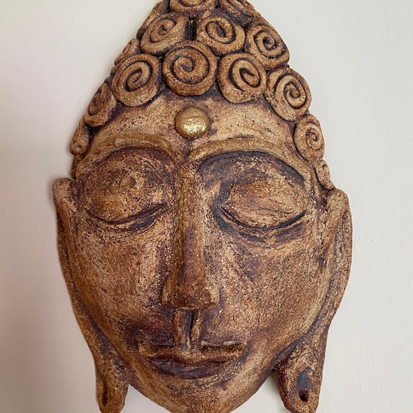 Peaceful buddha wall-art sculpture with gold earring