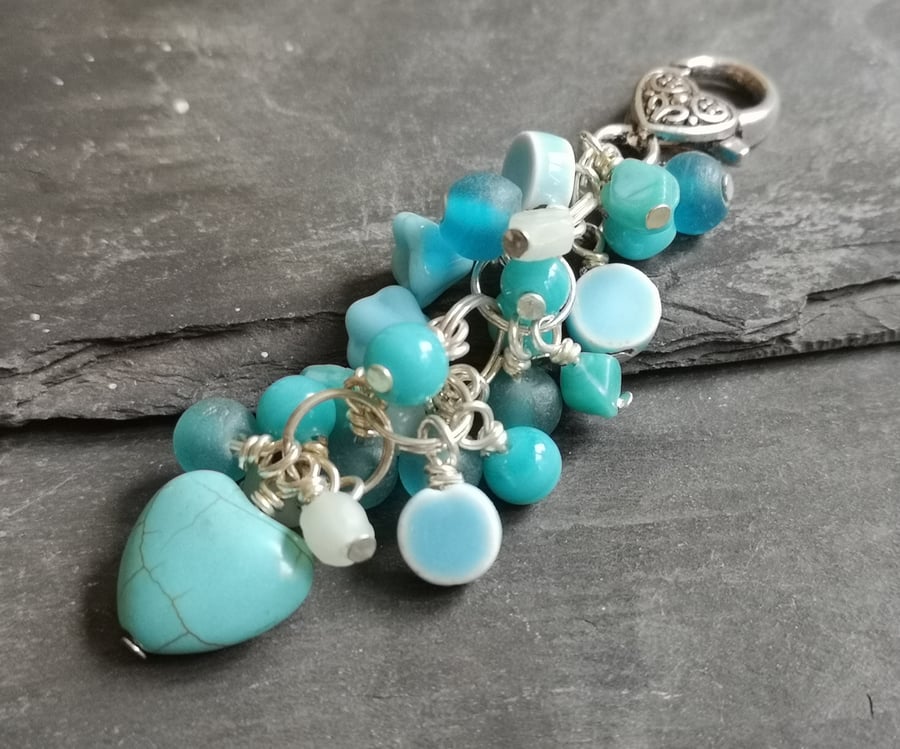 Silver bag charm with turquoise and blue glass beads