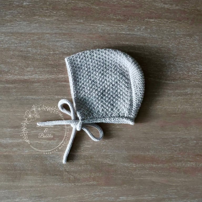 Hand Knitted Baby Bonnet in Silver Grey. 