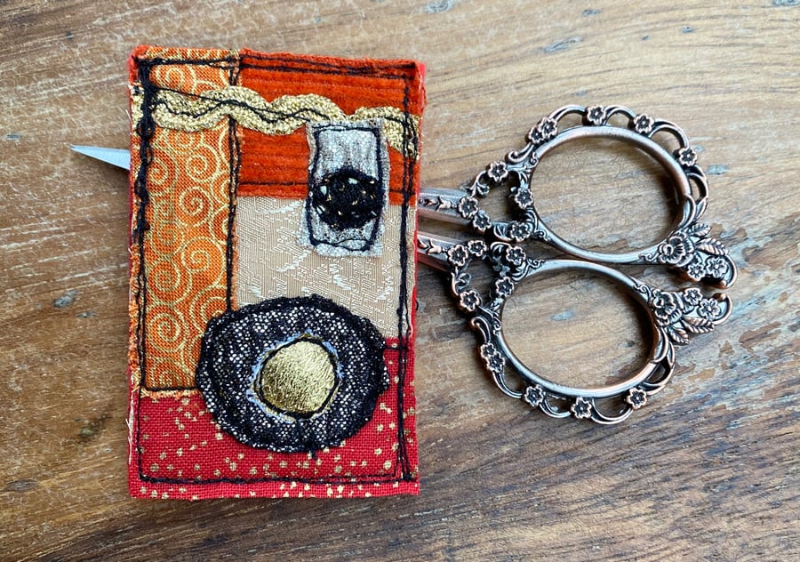 Upcycled geometric abstract brooch pin or badge. 