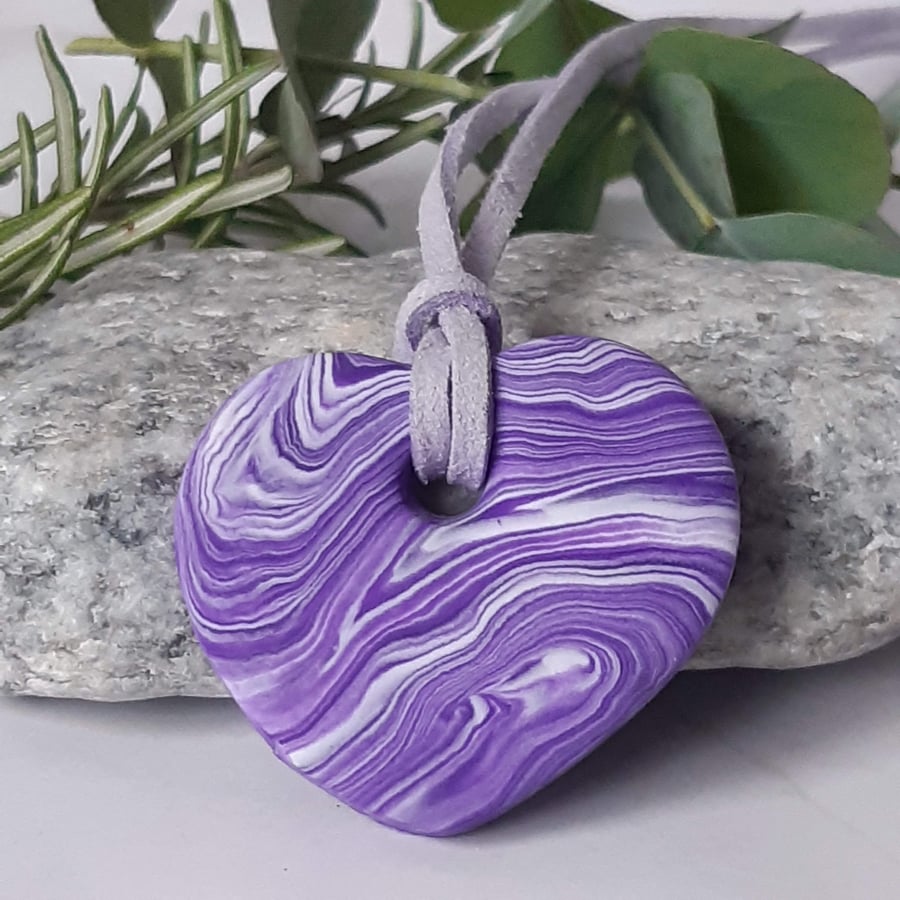 Purple and white heart shaped polymer clay pendant
